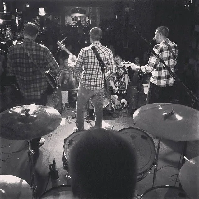 Flannel on stage at the Wild Buffalo in Bellingham, shot from behind the drum kit